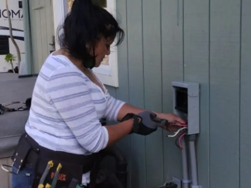 Licensed electrician wiring an exterior subpanel in Marksville