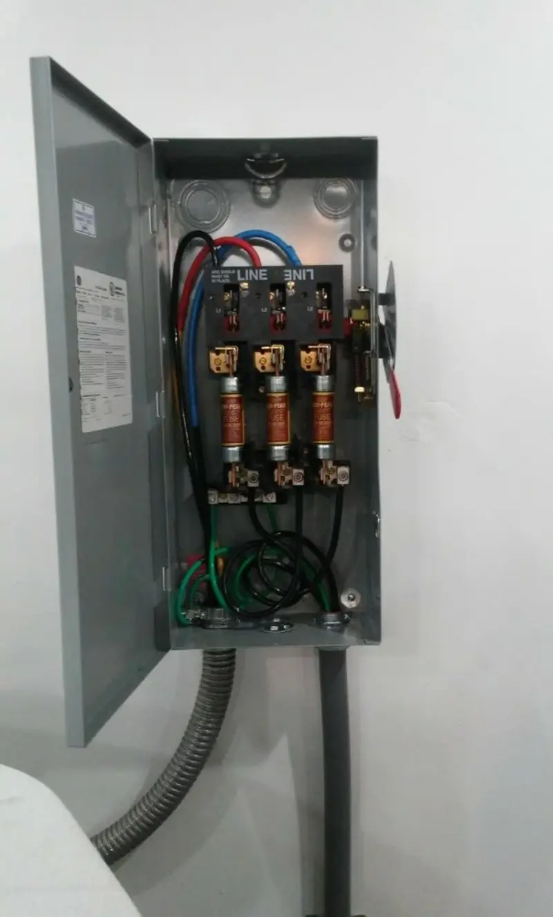 Three-phase disconnect switch installed for Smoke Detector Installation in Marksville